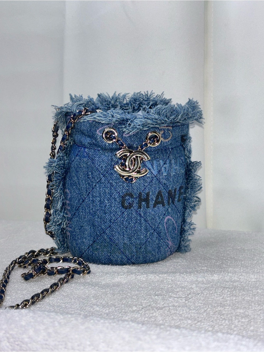 CHANEL Denim Fringe Mini Bucket Bag in Blue with Silver Hardware